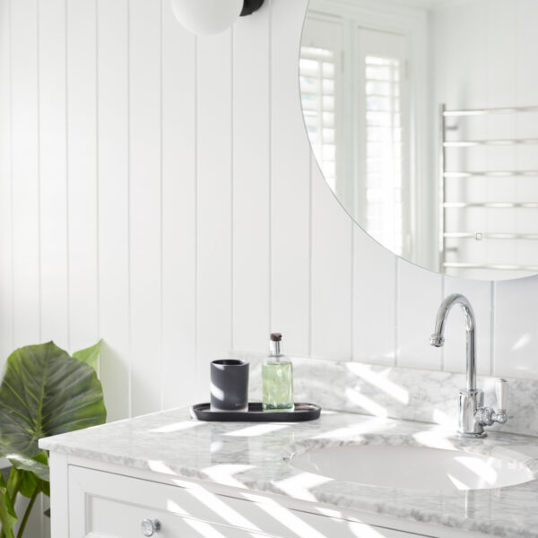 Free Standing vanity in white with Carrara Marble top